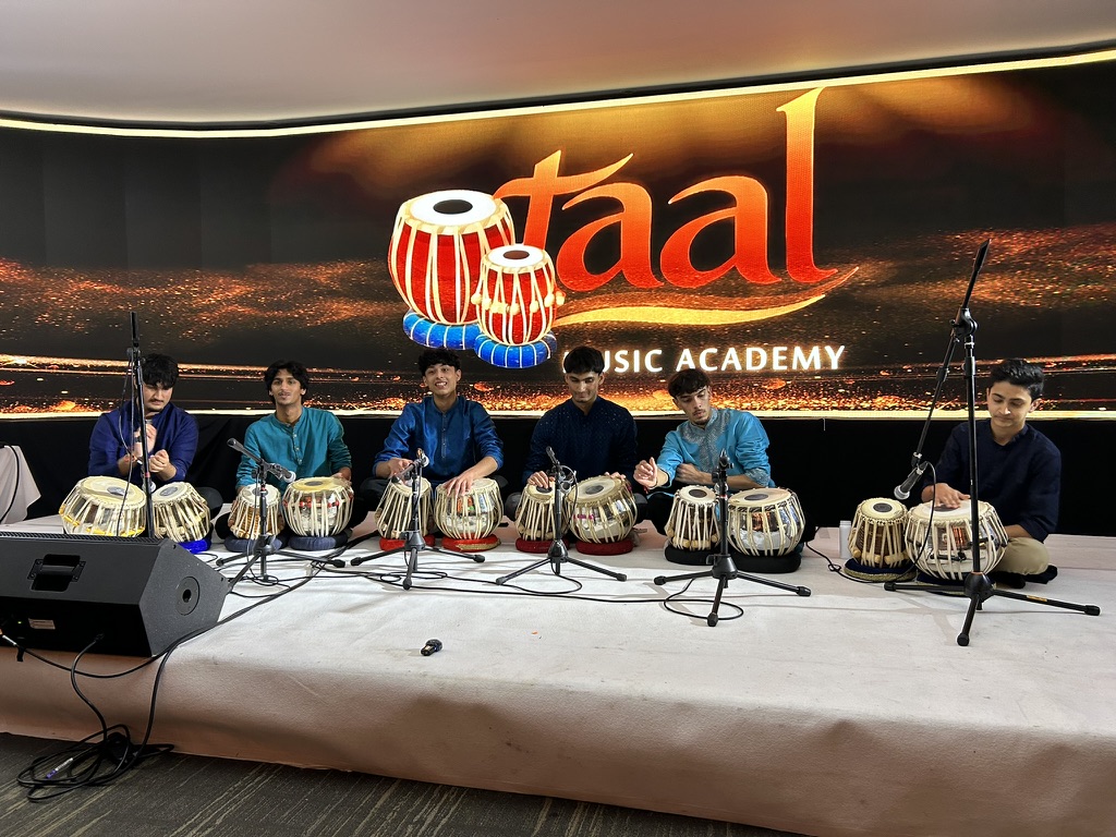 A Taal Music Academy tabla ensemble performing on stage